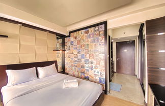 Photo 1 - Warm And Comfort Studio Apartment At Braga City Walk