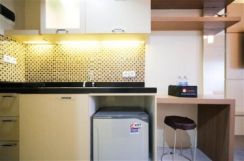 Photo 11 - Compact And Comfy Studio At Puri Mas Apartment