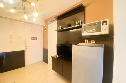 Photo 14 - Great Deal And Comfortable 2Br At Bassura City Apartment