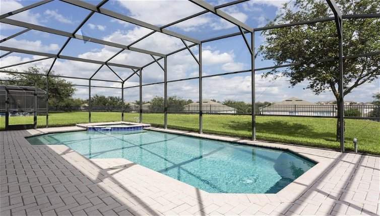 Photo 1 - 6BR w Greenview Pool Getaway Only 2 Miles to Disney