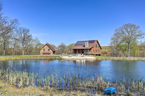 Photo 1 - Poconos Family Fun: Waterfront Cabin w/ Deck