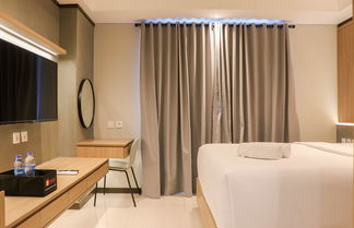 Foto 1 - Best Deal And Cozy Studio At Daan Mogot City Apartment