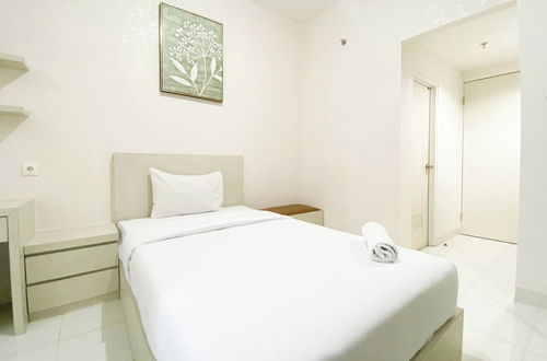 Foto 4 - Minimalist And Homey Studio Room At Amartha View Apartment