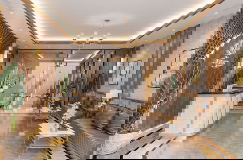 Foto 2 - Yumy Homestay Grand Park City