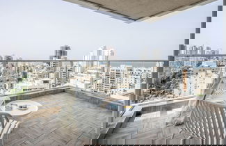 Photo 1 - Seaside High-Rise Apt by Sea N' Rent