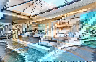 Foto 1 - Amalfi Vacation Rental: Stylish 3-BR Retreat Steps from Vanderbilt Beach. Relax by the Private Pool and Enjoy Modern Amenities. Ideal for Families with Easy Access to Mercato and Local Attractions