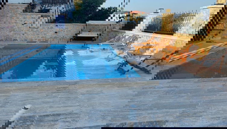 Photo 1 - Atlas homes
