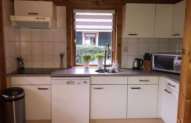 Bungalow met Omheinde Tuin op de Veluwe - Photo 10