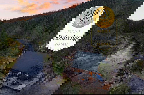 Photo 1 - Riversong Lodge by Avantstay Sauna + Hot Tub On The Truckee River