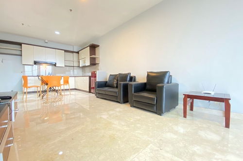 Photo 13 - Cozy 2Br Apartment At Dago Butik