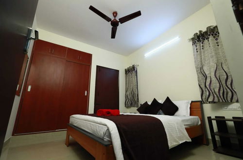 Foto 8 - Tranquil Orchid Serviced Apartment