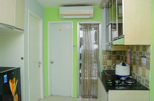 Photo 8 - Comfortable 2BR Bassura City Apartment near Bassura Mall