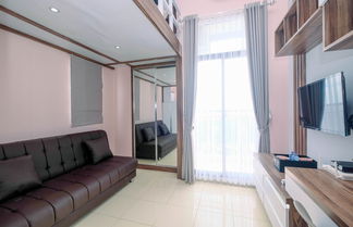 Foto 1 - Minimalist and Comfy Studio Dave Apartment By Travelio