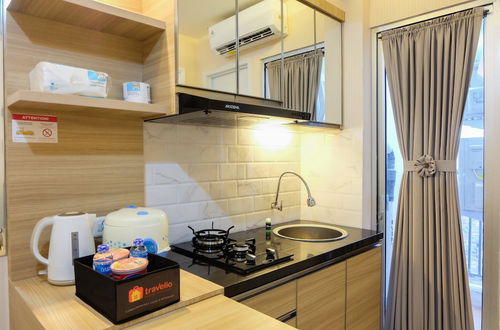 Photo 11 - Clean 2BR Bassura City Apartment