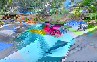 Photo 1 - Urban Oasis W/hot Tub, Heated Pool And Private Movie Theater 2 Bedroom Home by RedAwning