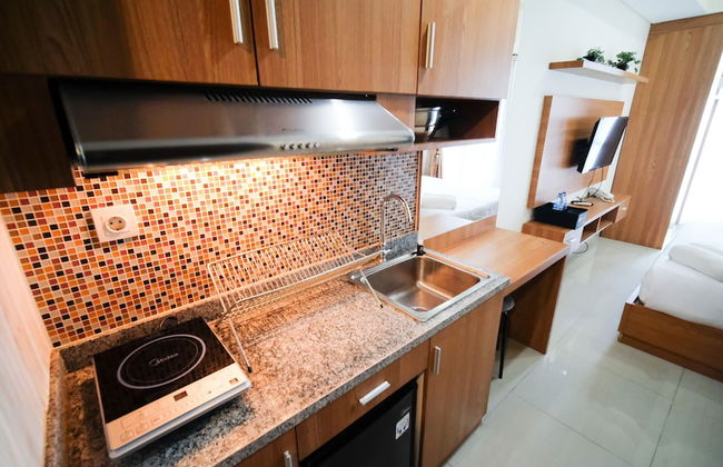 Strategic And Homey Studio At Tamasari Papilio Apartment - Photo 9