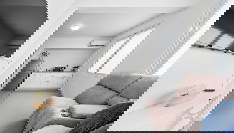 Photo 1 - Condado by Otium