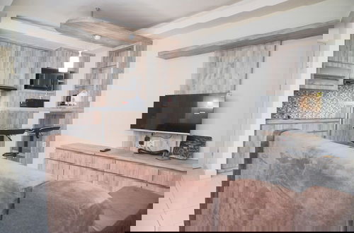 Photo 16 - Comfort And Minimalist Studio At Amethyst Apartment