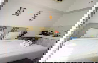 Foto 1 - Nice And Comfy Studio At Ambassade Kuningan Apartment