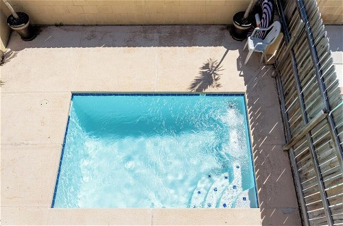 Photo 19 - Quiet Townhome Close to Beach With Private Pool