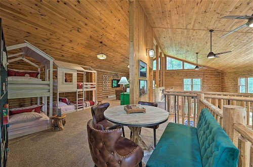 Photo 13 - Luxe Riverfront Lodge by Torch Lake With Kayaks