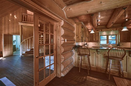 Photo 13 - Executive Plus 44 - Majestic log Chalet With hot tub Sauna Heated Pool and Close to Activities