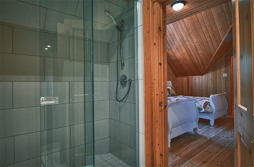 Photo 25 - Executive Plus 44 - Majestic log Chalet With hot tub Sauna Heated Pool and Close to Activities