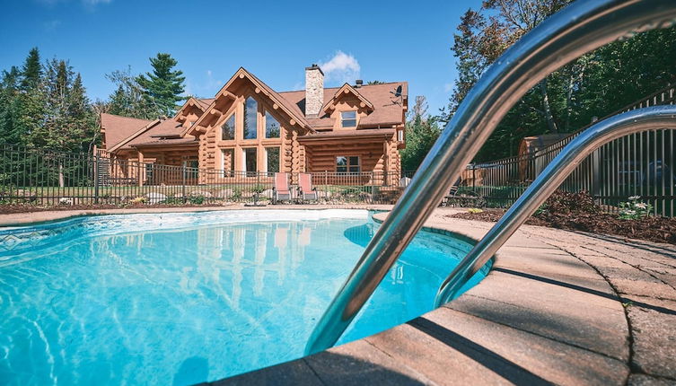 Photo 1 - Executive Plus 44 - Majestic log Chalet With hot tub Sauna Heated Pool and Close to Activities