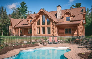 Photo 2 - Executive Plus 44 - Majestic log Chalet With hot tub Sauna Heated Pool and Close to Activities