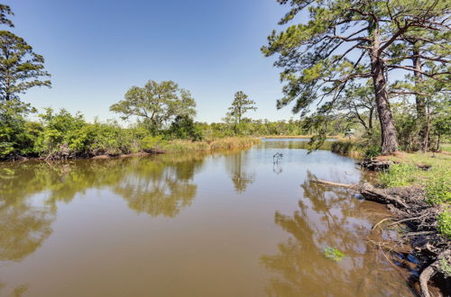 Photo 2 - Riverfront Magnolia Springs Cabin Rental w/ Grill