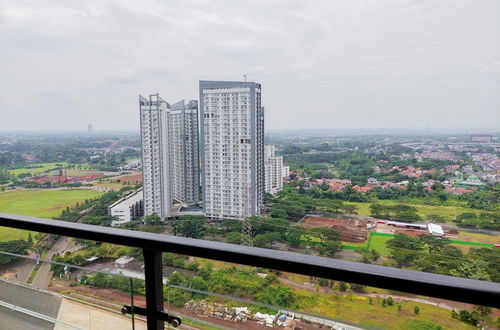 Foto 10 - Simple And Homey Studio At Sky House Bsd Apartment