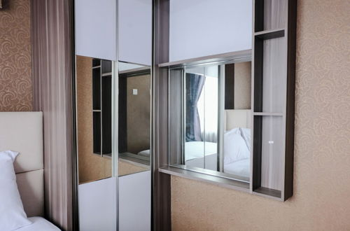 Photo 11 - Modern 2Br Room At Tamansari Panoramic Apartment