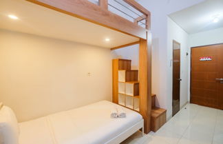 Photo 2 - Comfort Studio Room With Bunk Bed At Dave Apartment