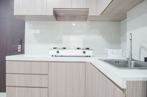 Photo 7 - Nice And Modern 2Br At Daan Mogot City Apartment