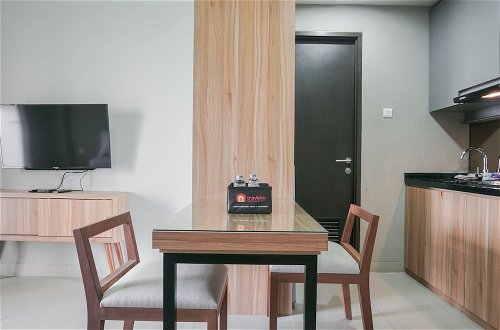 Photo 25 - Minimalist And Cozy Stay 1Br Apartment At Mustika Golf Residence