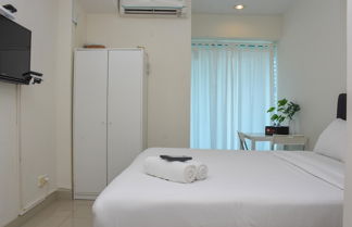 Foto 1 - Comfort And Nice Studio At Grand Kamala Lagoon Apartment