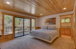 Photo 2 - Black Bear by Avantstay Spacious Viking Lodge in Tahoe Donner w/ Game Room & Hot Tub