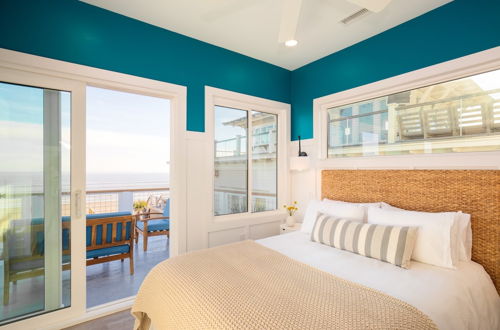 Photo 9 - Ocean's Eye by Avantstay Beach Front Home w/ Roof Top, Pool & Putting Green