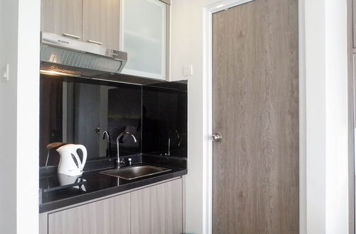 Foto 5 - Exclusive And Comfy Studio Room Apartment At Taman Melati Surabaya