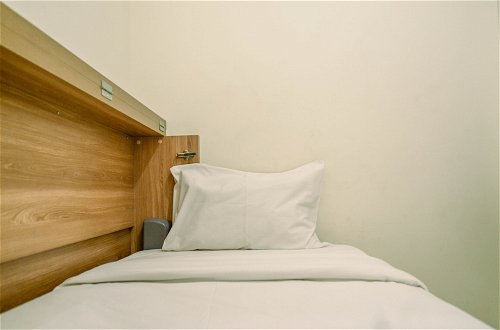 Photo 3 - Comfort And Simple 2Br At Green Pramuka City Apartment