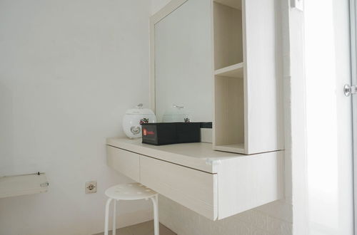 Photo 11 - Compact Studio At Bassura City Apartment