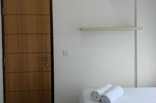 Photo 3 - Simply And Clean 2Br Apartment At Vida View Makassar