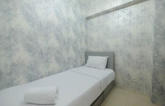 Foto 3 - Strategic And Restful 2Br At Bassura City Apartment