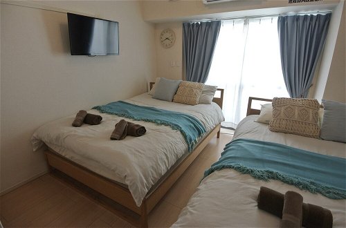 Foto 10 - Daruma apartment
