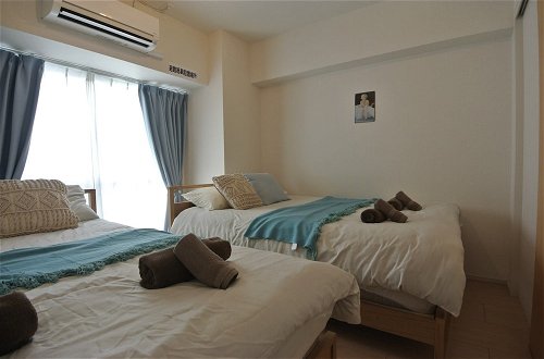Foto 9 - Daruma apartment