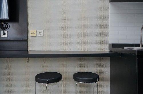 Photo 10 - Nice And Cozy Studio At Bintaro Icon Apartment