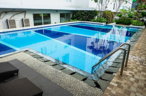 Photo 33 - Pool View 2BR with Sofa Bed Bassura City Apartment