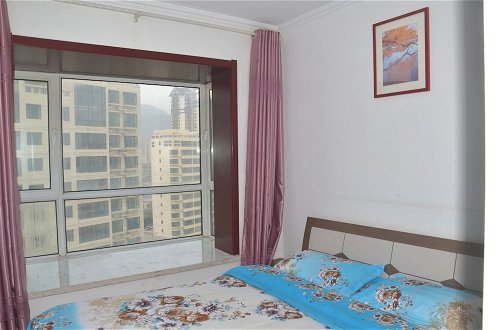 Foto 2 - Lanzhou Longshang Mingzhu Apartment Two-bedroom suite