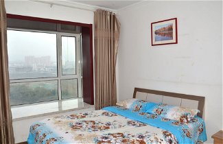 Foto 1 - Lanzhou Longshang Mingzhu Apartment Two-bedroom suite