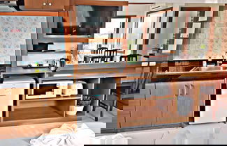 Foto 48 - Green Harbor Hotel & Service Apartment